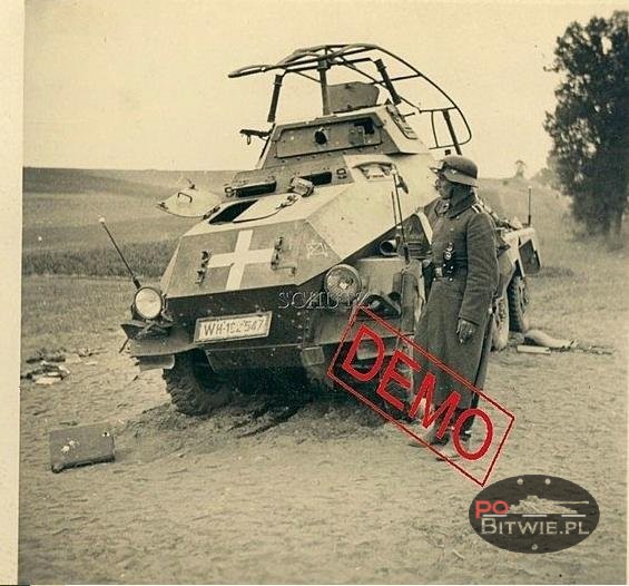 [PSW][#570]{003}{a} s.Pz.Sp.Wg (FU) Sd.Kfz.232 (8 Rad), I.!Aufkl.Rgt.(mot.).8, WH-192547, Piątnica koło Łomży, na polu, grób .jpg